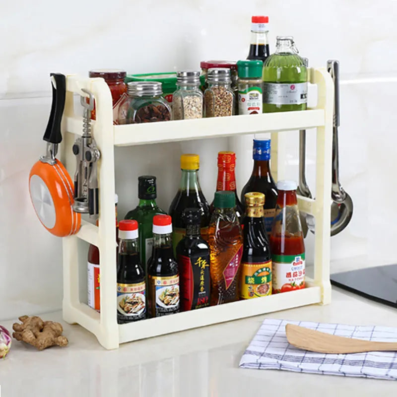 Foldable multi-layer kitchen storage rack in a choice of colours on a countertop.