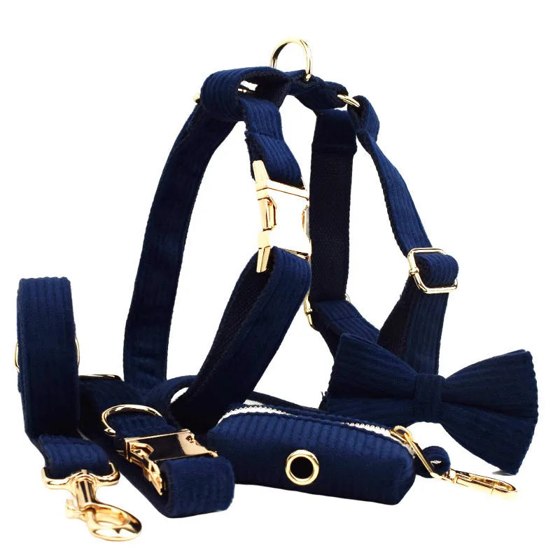 Navy blue corduroy dog collar and leash set with matching vest, poop bag, and decorative bow