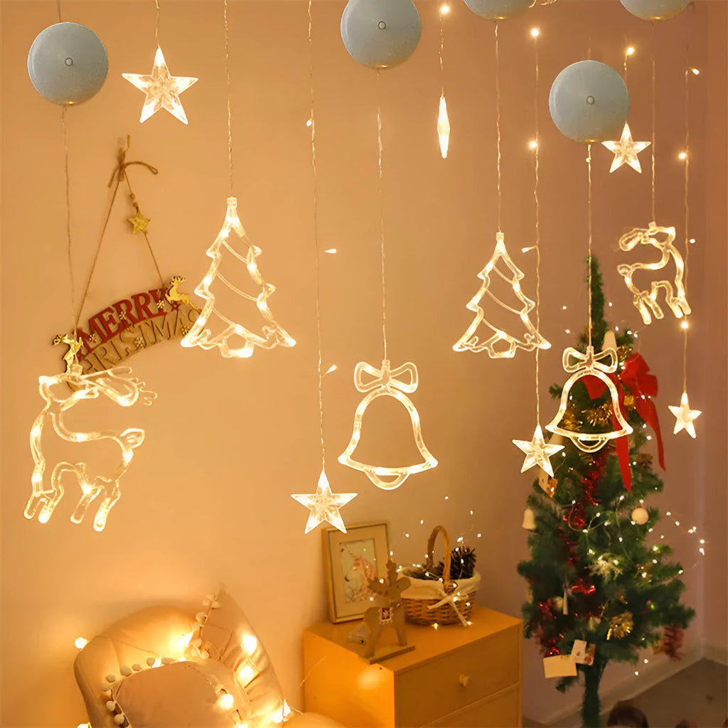 LED suction cup chandelier with Santa Claus, elk, and snowman shapes hanging on a window