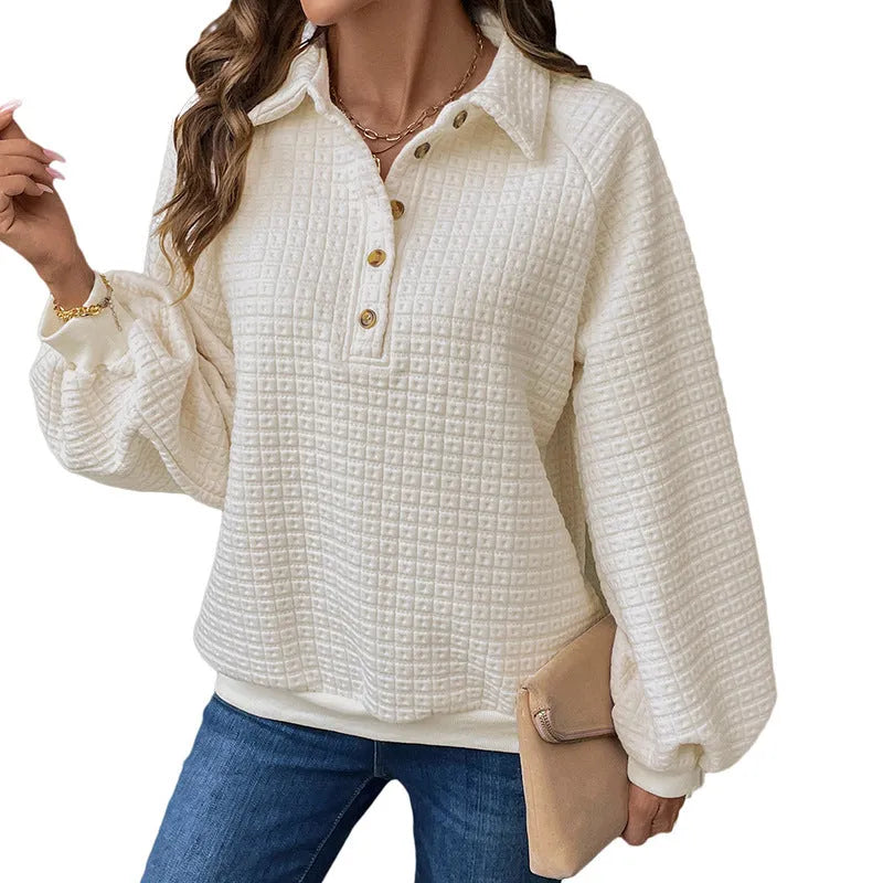 Women's milky white thick knit sweater with a polo collar.