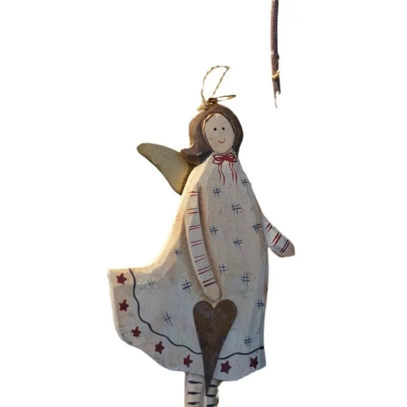 Hand-painted wooden door plaque showing a carved love heart design in a country style.