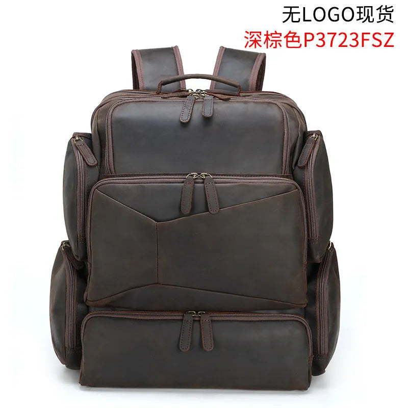 Dark brown genuine leather backpack for a 17-inch laptop, showing multiple pockets and double shoulder straps.
