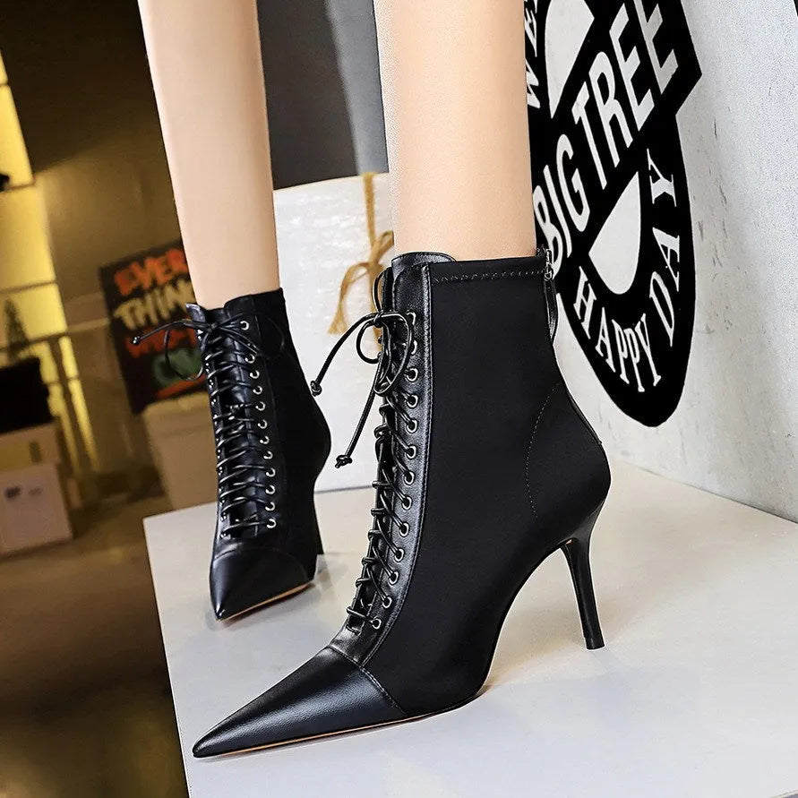 Black women's stiletto heel boots with pointed toe, back zipper, and 6-8CM heel, solid colour