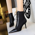Black women's stiletto heel boots with pointed toe, back zipper, and 6-8CM heel, solid colour