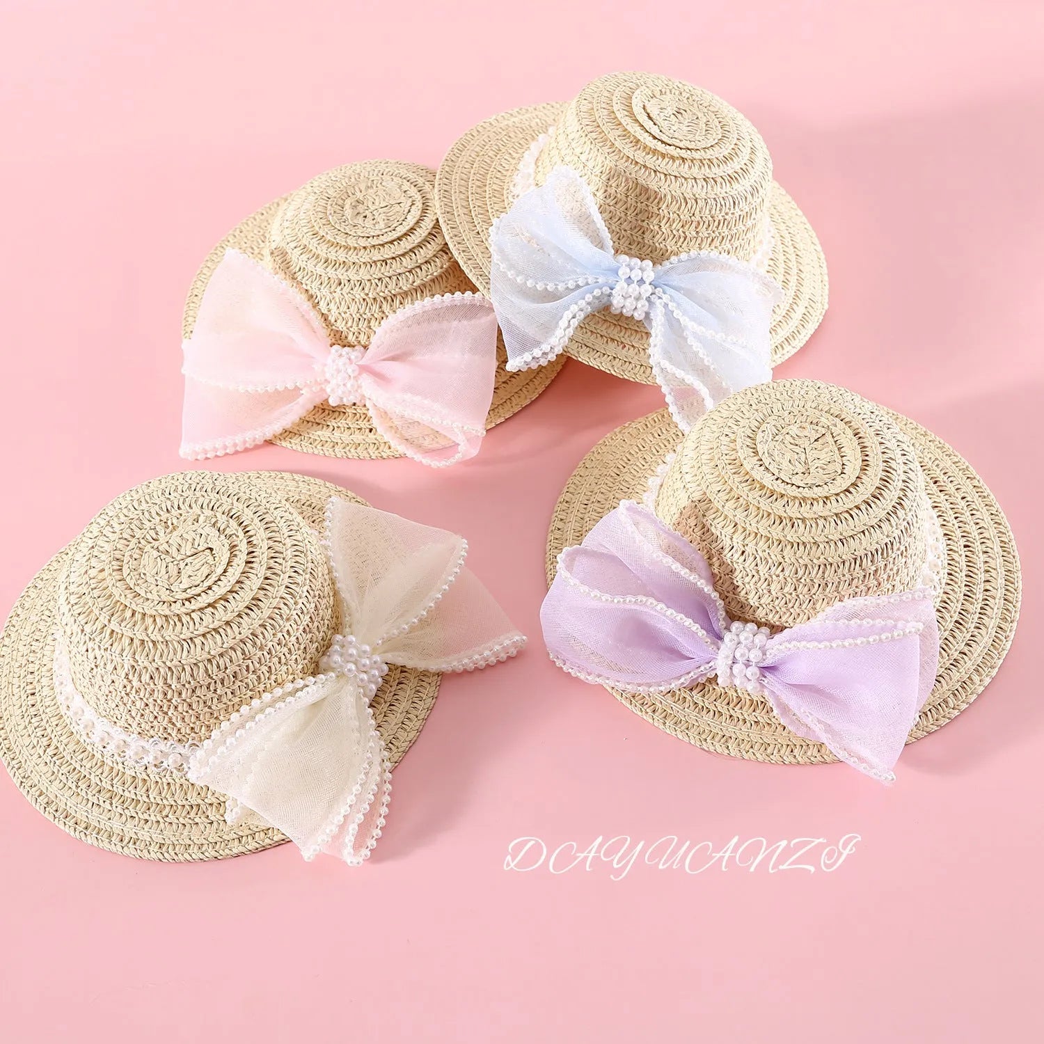 Pet cat wearing straw hat with pearl bow decoration in princess style costume accessory