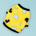 Coral fleece dog pyjamas in Bear style pattern on a female dog, side view, winter apparel