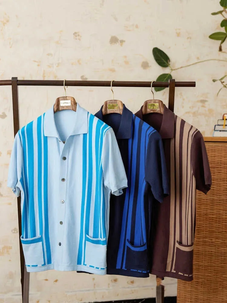 Short-sleeved striped polo shirt with a lapel collar in a light blue colour.