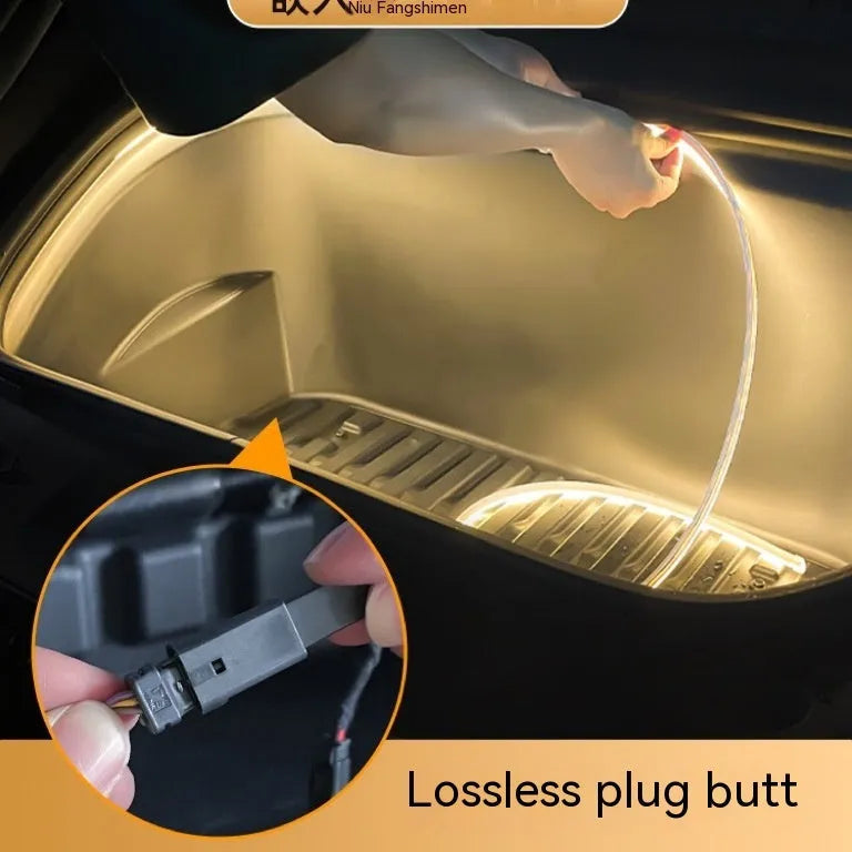 Tesla Model 3 and Y front centre console ambient lighting kit in soft silicone with three colour options.
