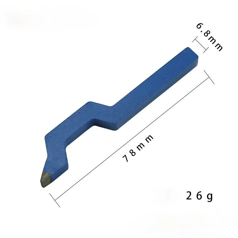 Curved character alphanumeric steel stamping tool for jewellery on a gold background.