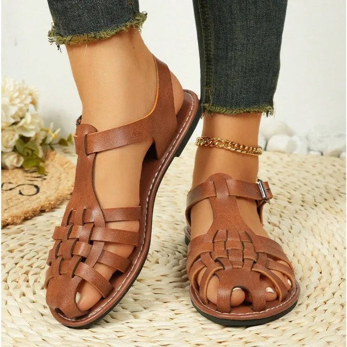 Dark brown women's vintage weave sandals with closed toe, roman buckle, and a soft rubber sole.