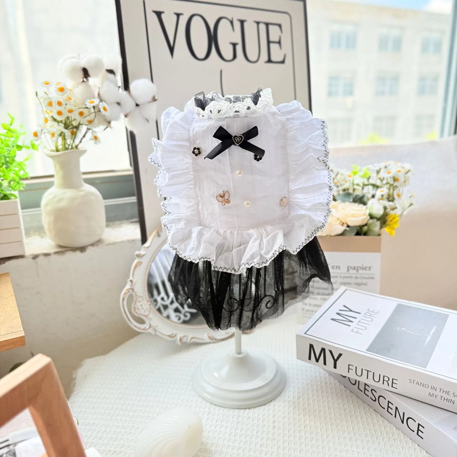 White polyester gauze skirt for a small dog, showing princess style and tiered design on a mannequin.