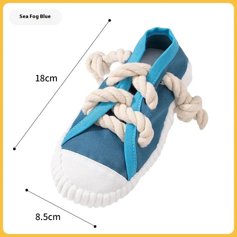 Plastic dog chew toy in yellow, black, or blue colours with a sound-making mechanism.