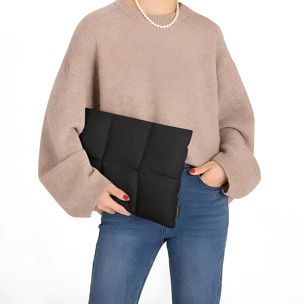 Soft black polyester laptop sleeve with sewing thread detail fitting 13-inch to 15.6-inch laptops