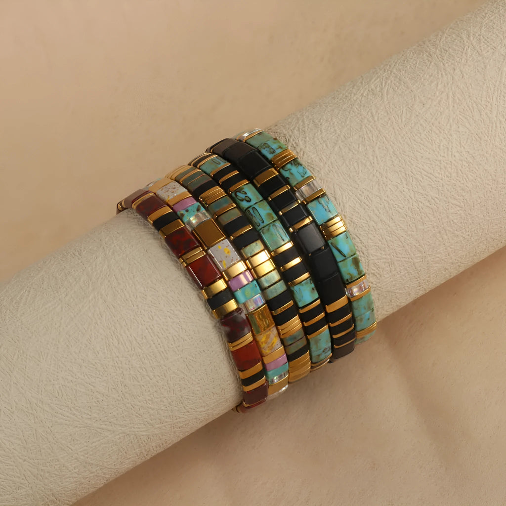 Geometric beaded bracelet with round glass and coloured glaze beads in five colour options.