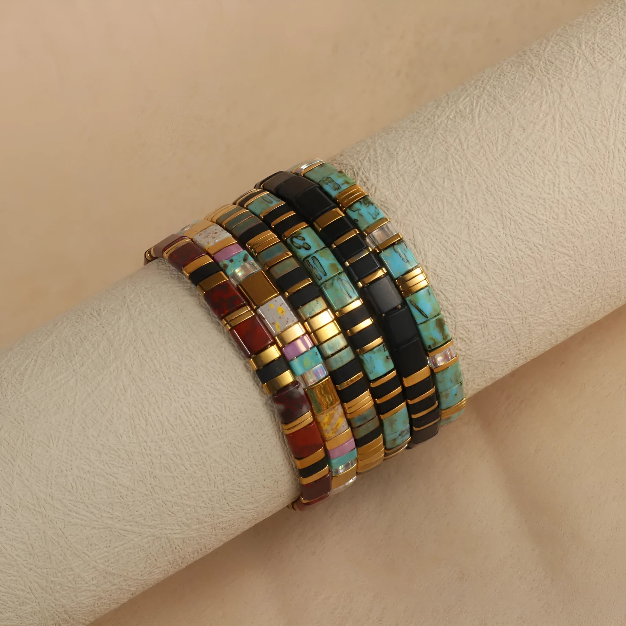 Geometric beaded bracelet with round glass and coloured glaze beads in five colour options.