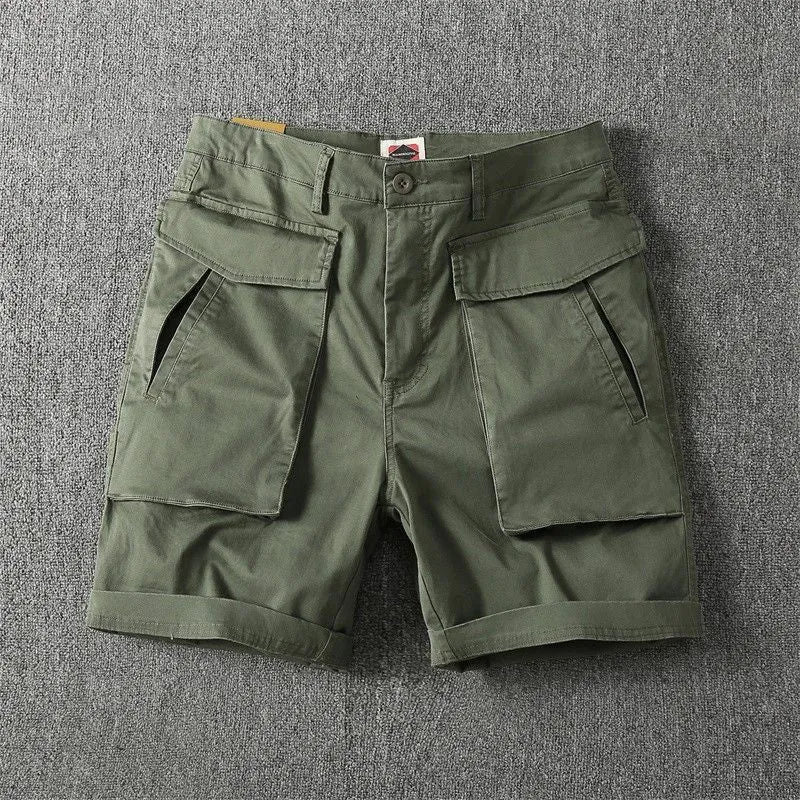 Men's beige cargo shorts with multiple pockets on a plain background, showing straight-leg fit and button closure.
