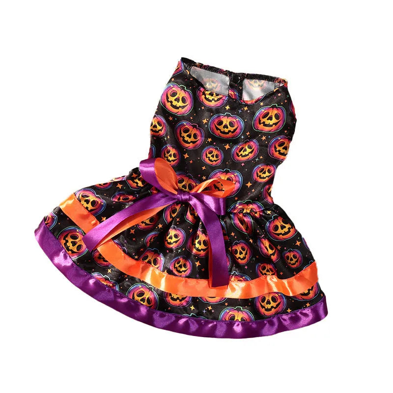 A dog wearing a double-layer Halloween skirt with a colourful pumpkin print.