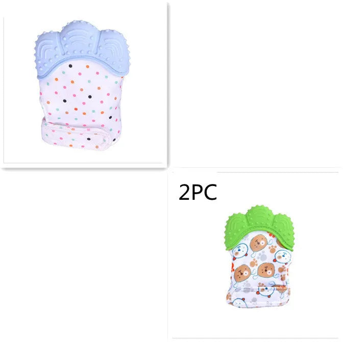 BPA-free silicone baby teether glove fastened with a white Velcro strap on a baby's hand