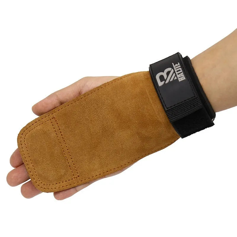 Pair of brown fitness wrist protectors showing silicone grip dots on the palm side.