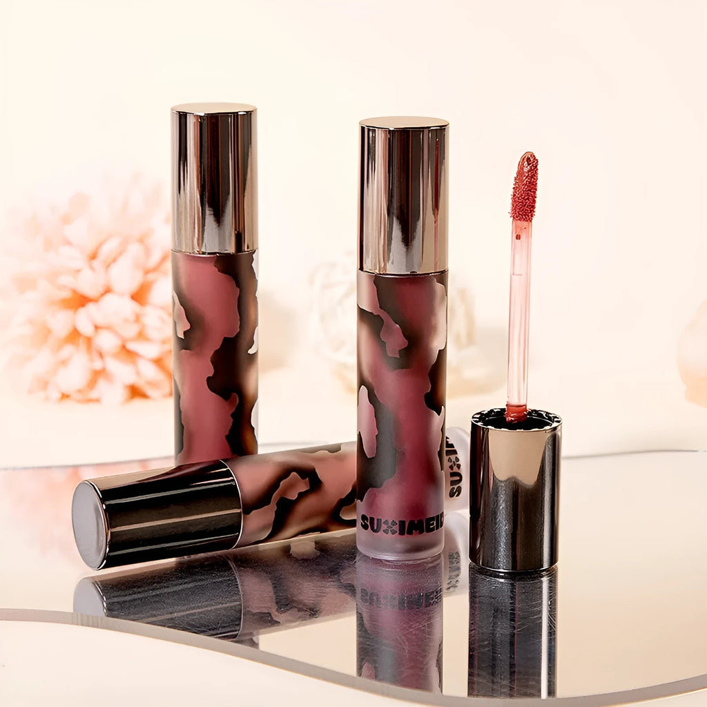 Matte liquid lipstick lip mud in five shades: orange brown, cool grey, cinnamon, jujube red, smoked purple.