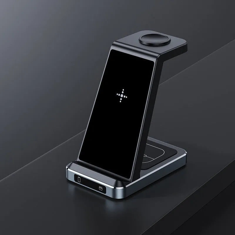 Black three-in-one wireless charger with phone watch and earbuds on charging pad