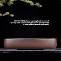 Handmade antique rectangular purple clay flower pot showing its size and natural colour.