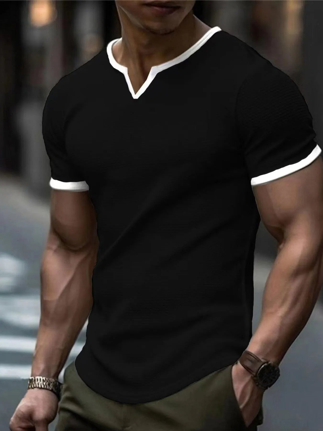 Colour-block V-neck short sleeve t-shirt in polyester waffle fabric on a neutral background.