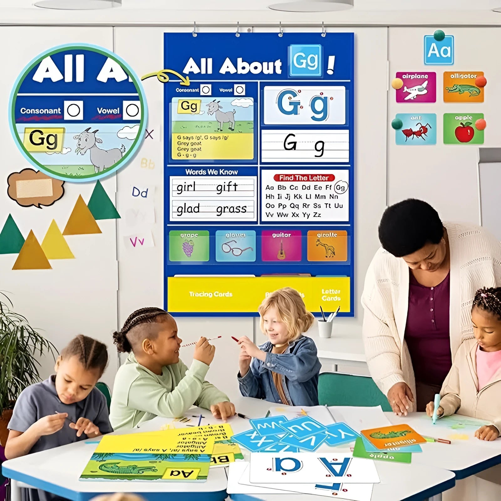 Alphabet learning chart for children with word cards, letter cards, and picture cards laid out.