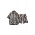Men's loose casual shirt and matching shorts two-piece set in a light grey colour.