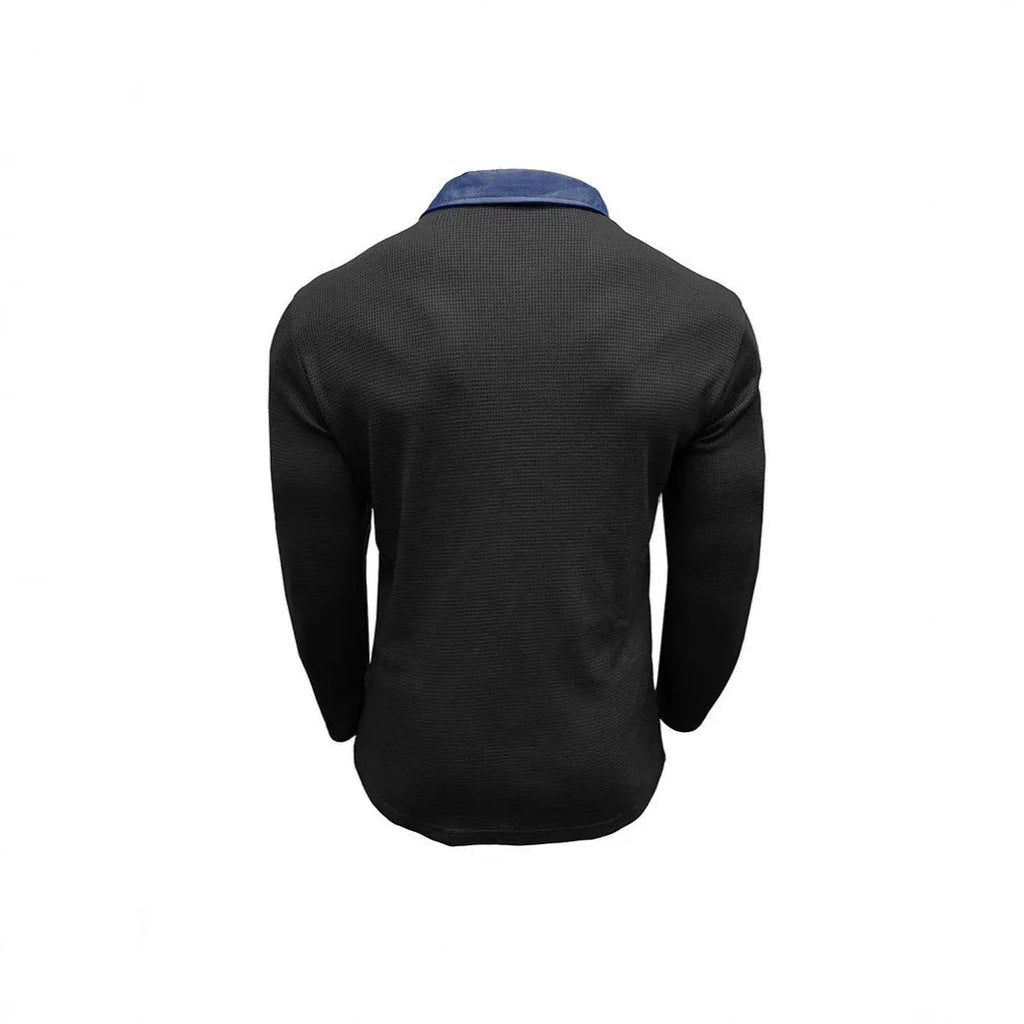 Men's long-sleeved waffle knit polo shirt in a loose fit, shown in a dark green colour.