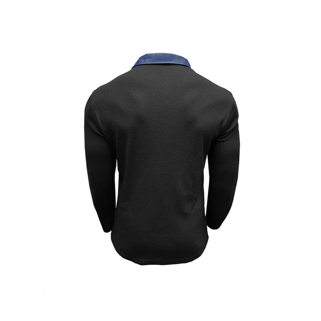 Men's long-sleeved waffle knit polo shirt in a loose fit, shown in a dark green colour.