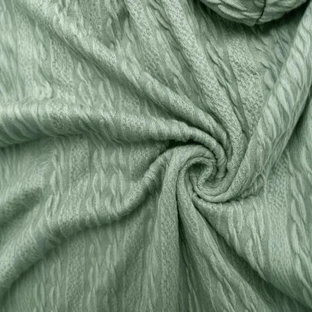 Green women's hooded zip-up coat with a loose fit, long sleeves, and a front zipper on a neutral background.