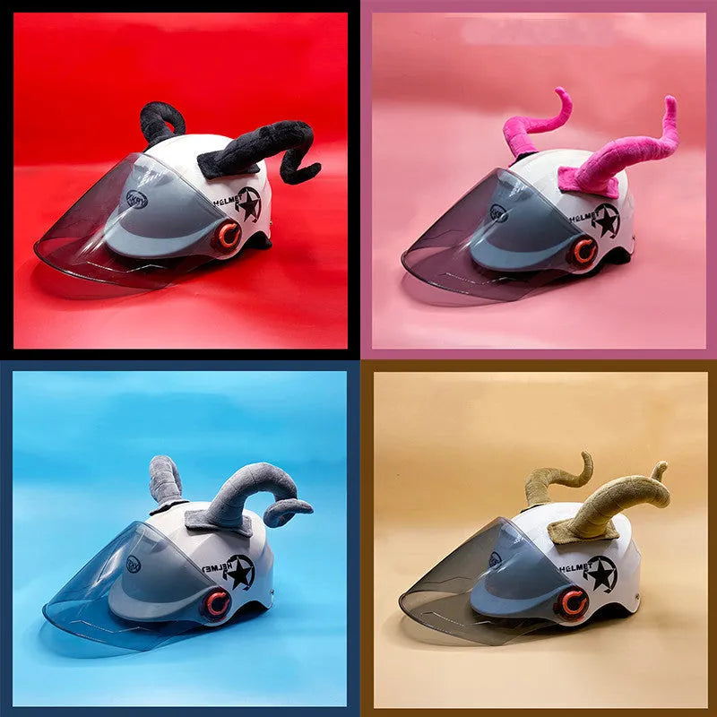 A pair of black demon bull horn ornaments for attaching to a motorcycle helmet.