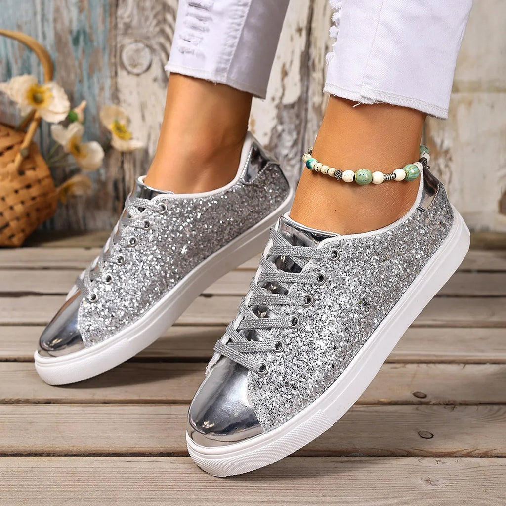 Women's plus size sequinned board shoes in black with front lace-up detail.