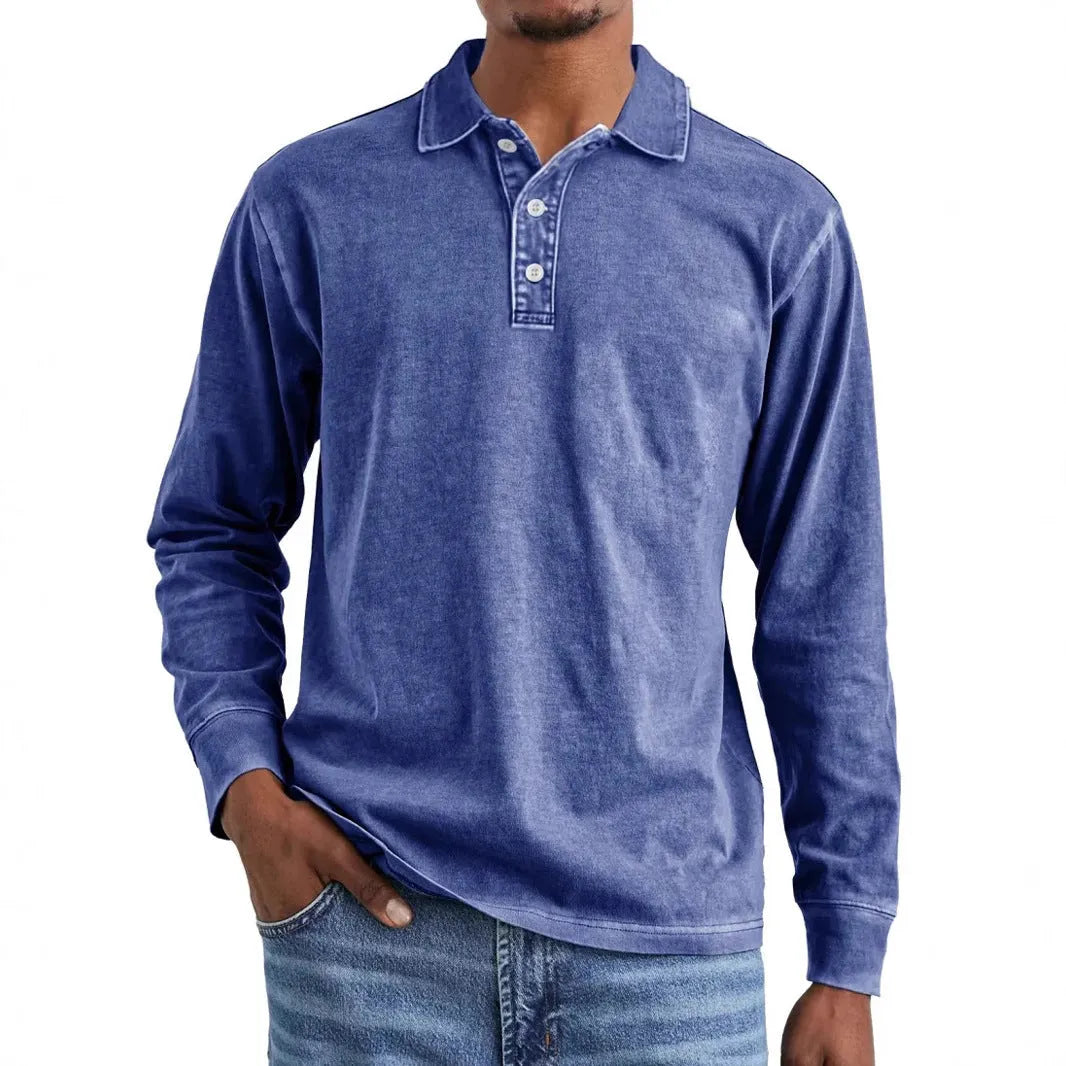 Man wearing a retro washed army green long sleeve polo shirt with a distressed lapel.