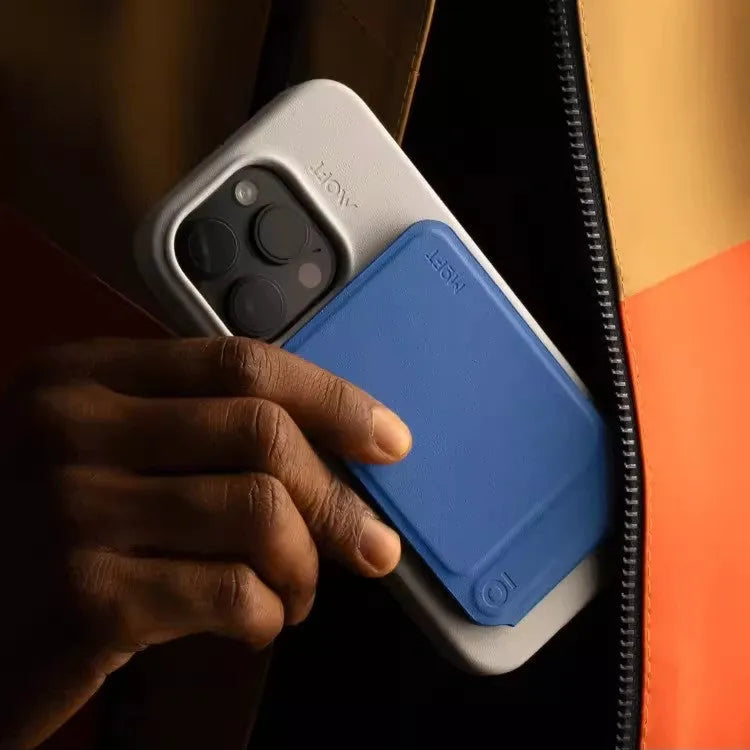 Magnetic mobile phone holder case in black, blue, green, and grey colours showing slim profile and integrated magnet.