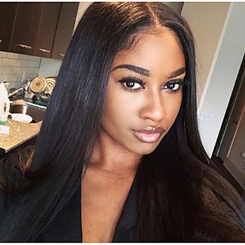 Long straight synthetic wig for women with centre-parted bangs in black colour.
