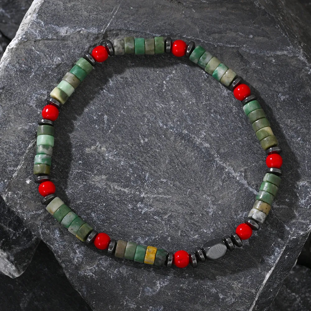 Bohemian style men's bracelet with cylindrical semi-precious stone beads on a hand-woven string.