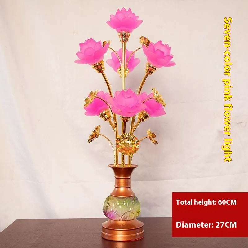 Coloured glaze pink and yellow LED lotus lantern for Buddha worship on an alloy stand.