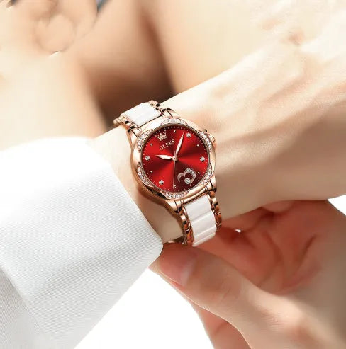 Olevs women's ceramic watch with luminous hands, rose shell blue dial, and matching ceramic band