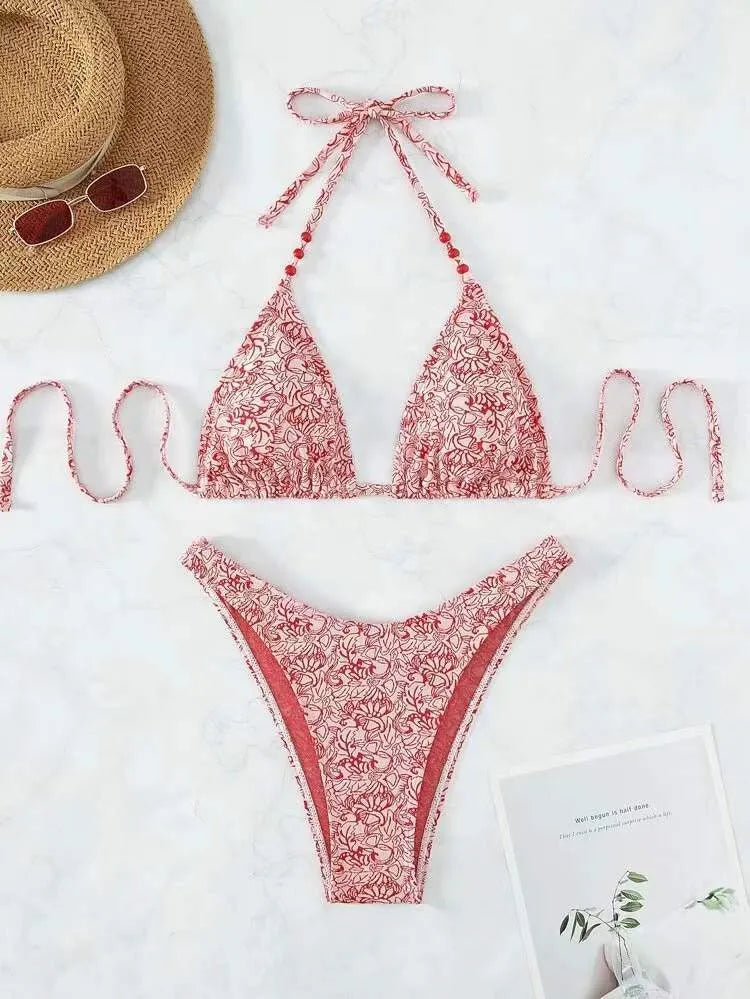 Women's floral print bikini halter swimsuit set in red colour with coordinating shorts
