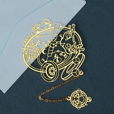 Brass hollowed-out metal bookmark featuring a zodiac constellation design on a light background