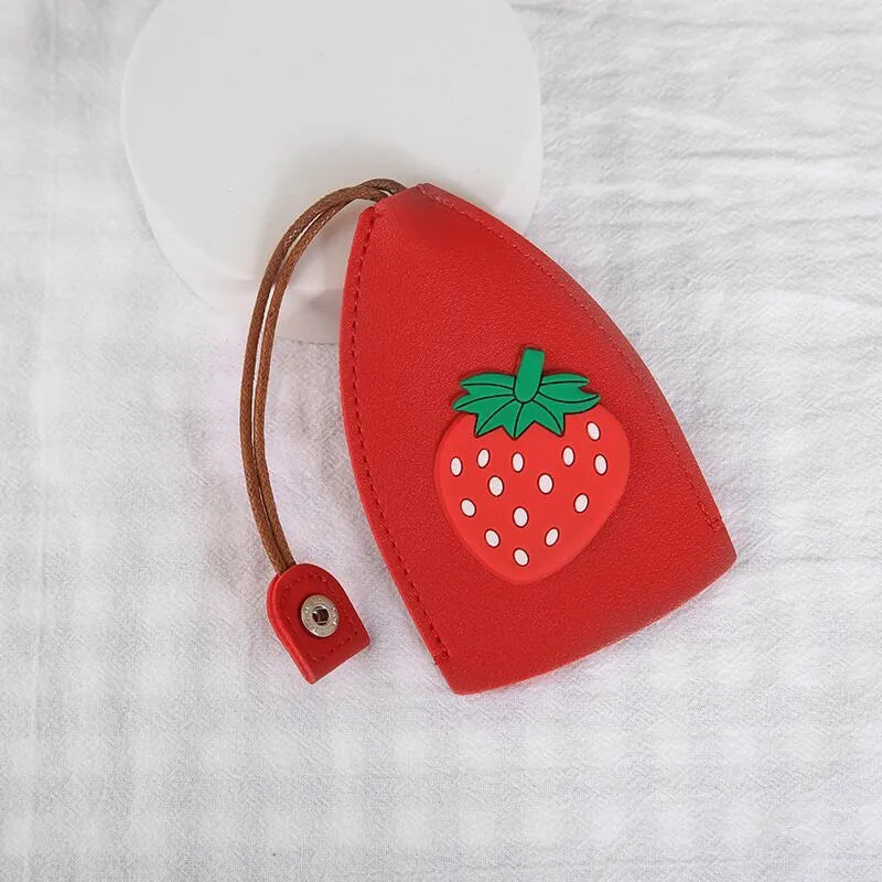 Colourful cartoon PU leather pull-out key case for car keys, shown open and closed