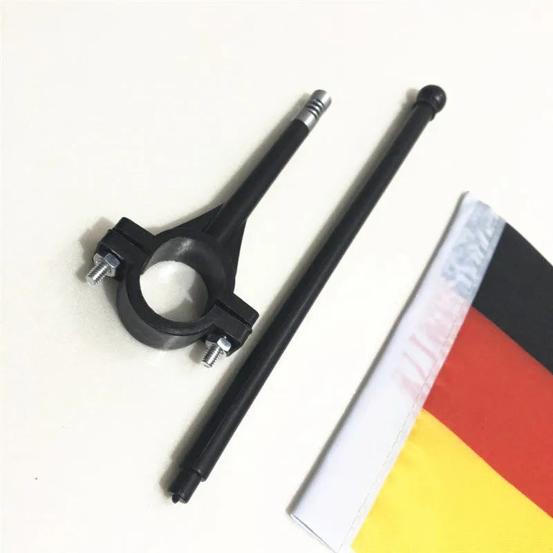 Square polyester flag on a plastic handlebar flag pole for bicycles.