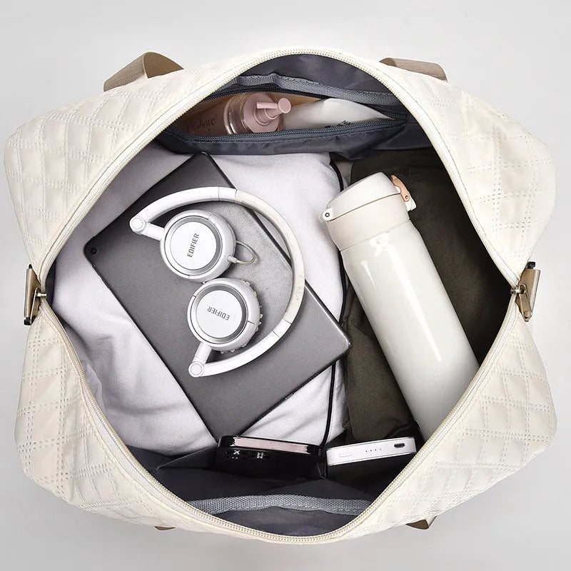 Large Oxford cloth leisure travel bag in a solid colour with a capacity of 36-55 litres.