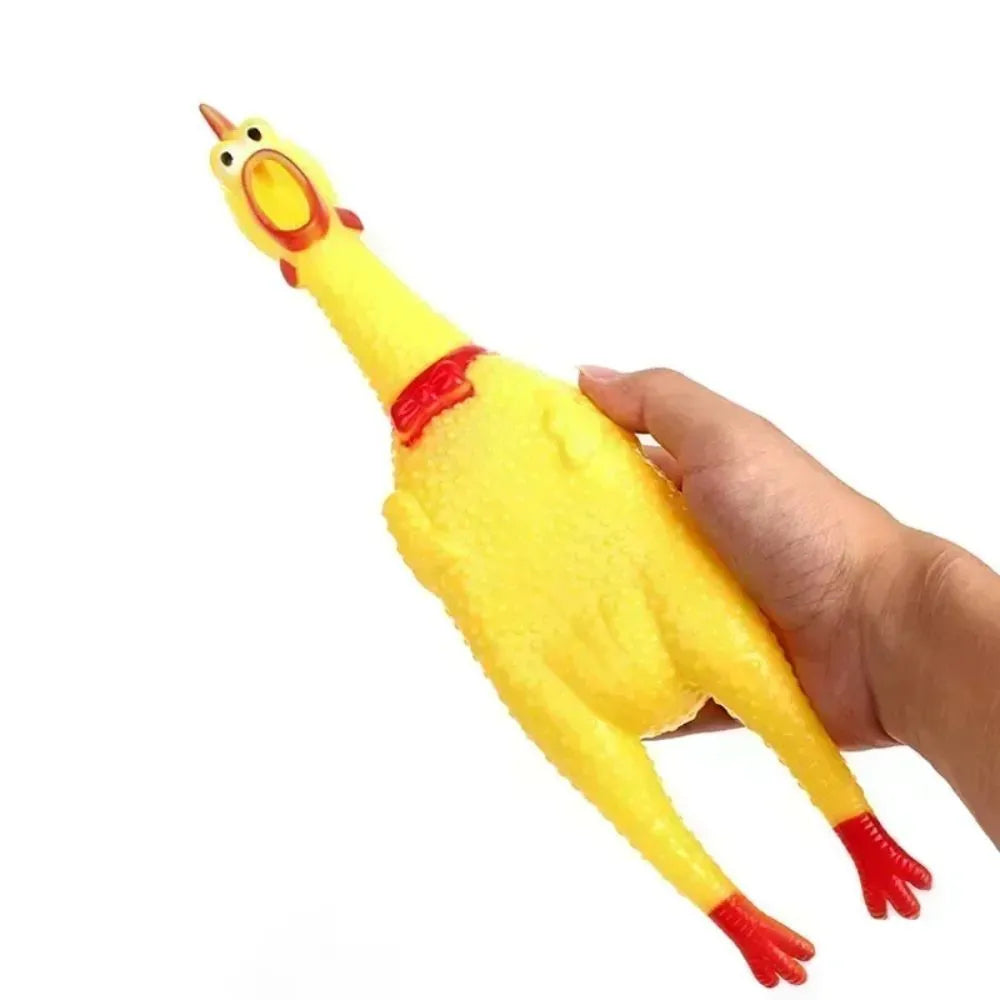 Yellow rubber Screaming Chicken dog squeak toy shown in small, medium, and large sizes.
