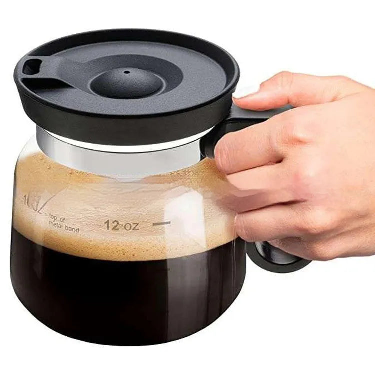 Transparent borosilicate glass coffee maker with silicone cover showing 355 to 473ml capacity