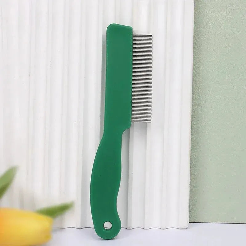 Green plastic-handled pet flea comb with stainless steel pins for dogs and cats.