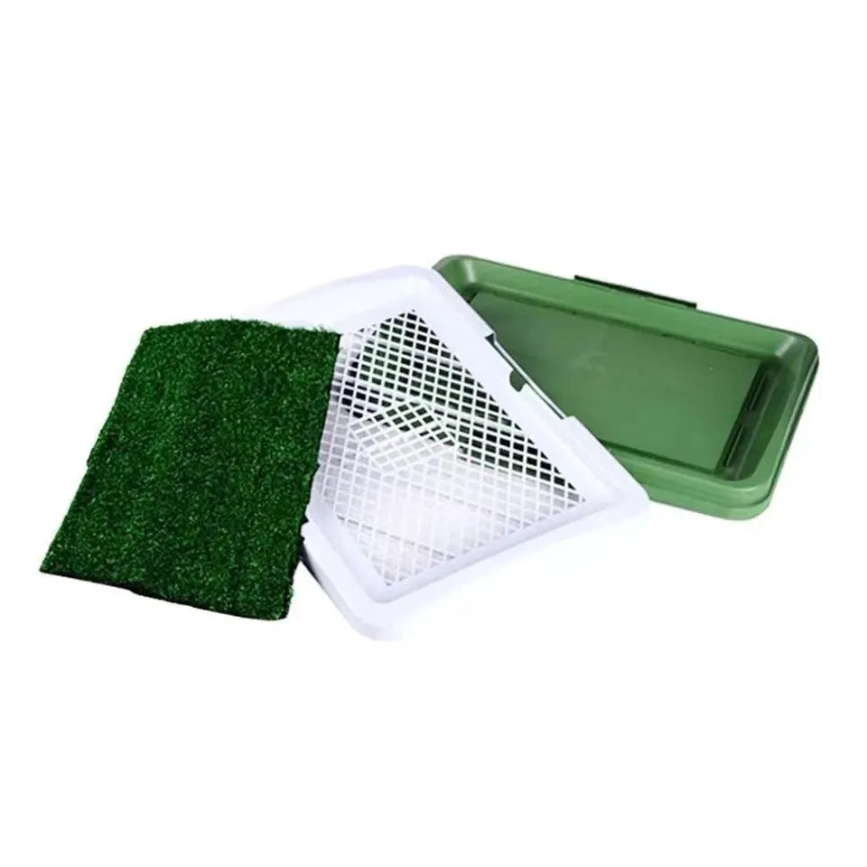 Green artificial grass dog toilet tray measuring 54cm by 38cm with three-layer construction