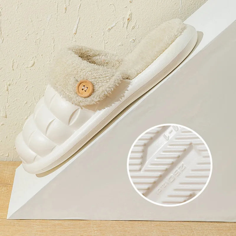 Women's pink detachable plush EVA winter house slippers with non-slip sole shown from the side.